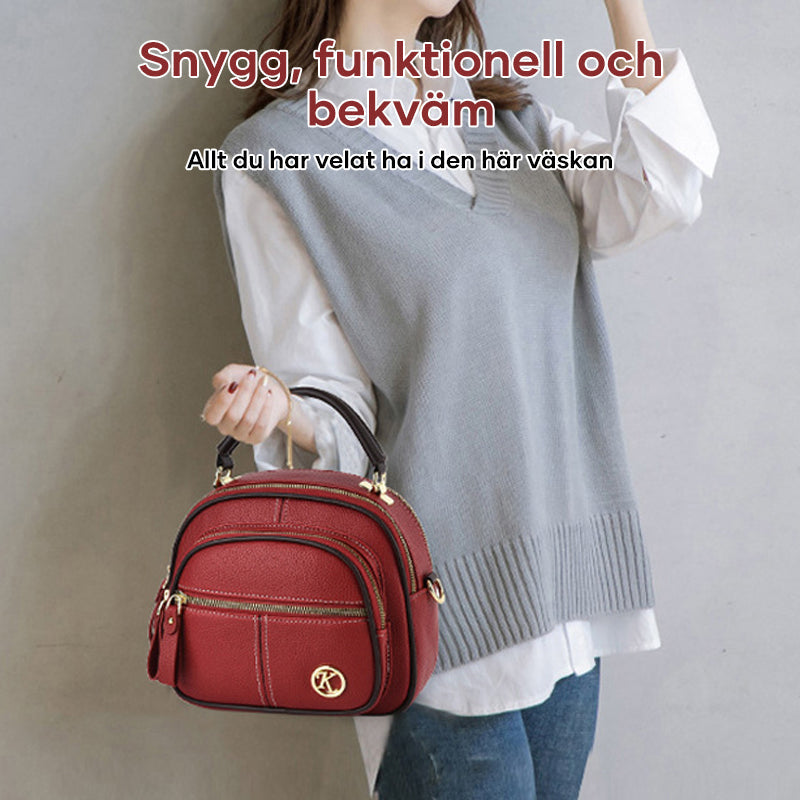 Multifunktionell justerbar crossbody-väska